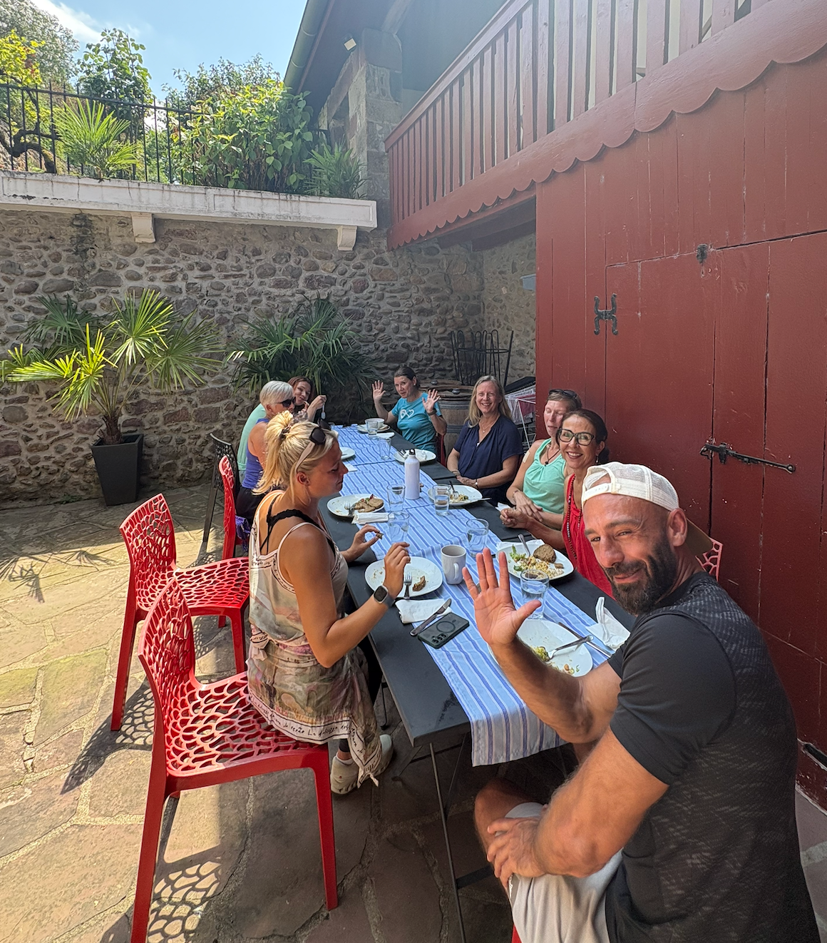 Camino companions sharing a meal outdoors